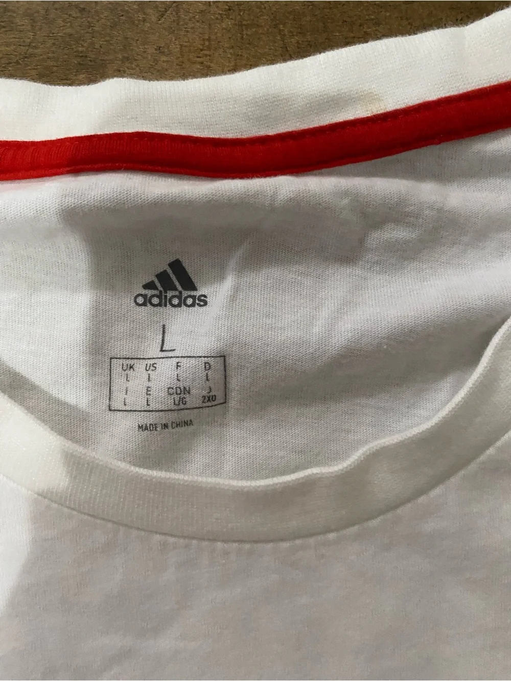 adidas White Long-Sleeve Tee with Yellow Tiger Graphic and Navy Accents